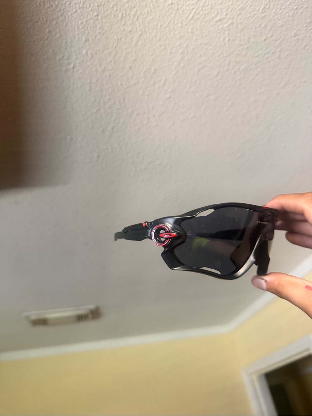 Black Sport Wrap Sunglasses with Red Accent Oakley